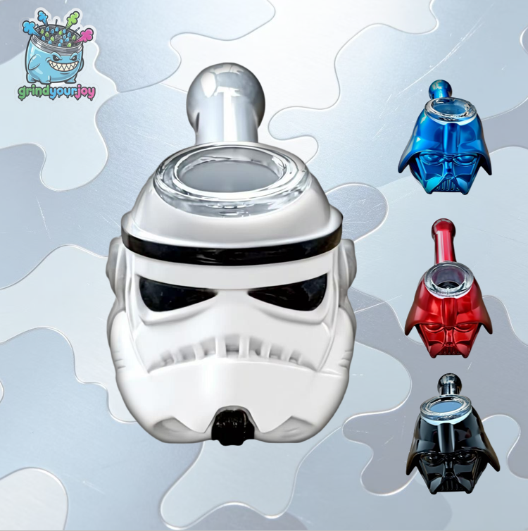 White helmet-shaped bowl-and-mouthpiece accessory with a clear bowl and rear mouthpiece, alongside blue, red, and black versions